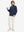 Full-body view of model wearing kids soft lightweight fleece lined jacket in navy, displaying the jacket's fit and design.