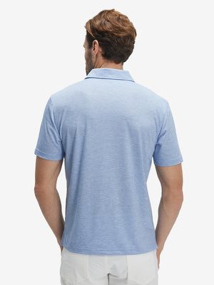 Back waist-up shot of model wearing light blue ultra-light quick dry moisture wicking collared polo shirt