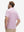 Back upper body view of model in Performance quick dry print golf polos with subtle white pink floral tone