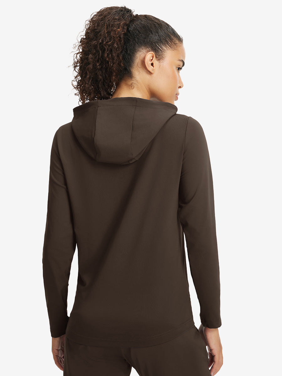 Back upper view of model in women's lightweight hoodies pullover, showing relaxed fit in coffee brown.
