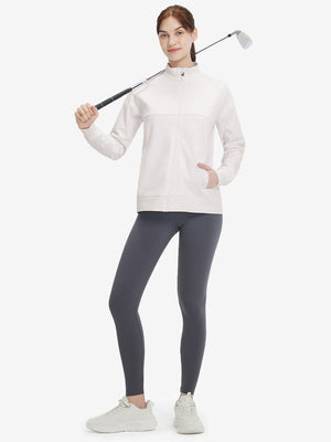 Women's Water-Resistant Stretch Fleece Lined Jacket in oyster gray , model holding golf club 