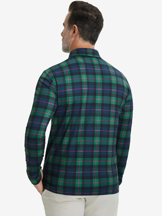 Back upper body view of the lightweight print polo in dark plaid, model turns slightly with relaxed pose.