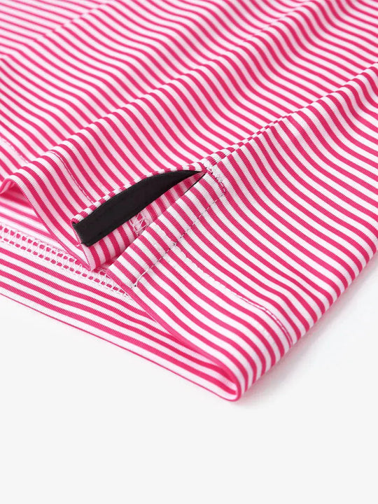 Detailed view of side hem slit on Cooling Stripe Golf Shirt in ROSE STRIPE, showing comfort and design