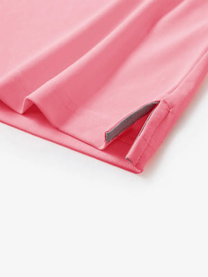 Detail shot of hem opening on PINK Ventilated Pique Performance Polo