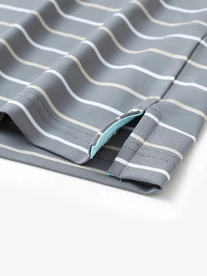 Hem slit detail of NEUTRAL STRIPE Kids Stylish Stripe Polo Shirt, highlighting finish and stitching.