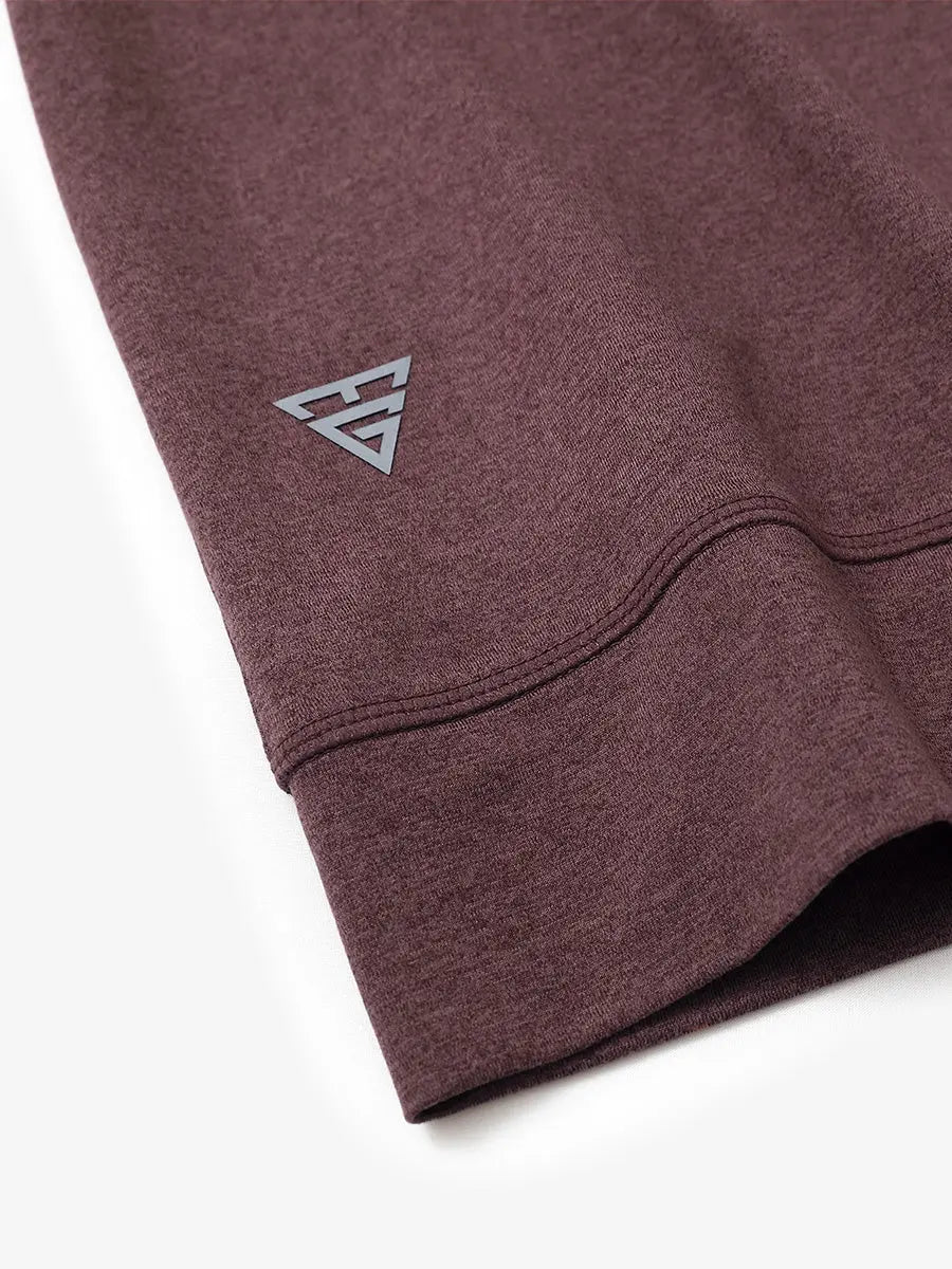 Sleeve cuff logo detail of BRICK HEATHER Quarter Zip Melange Pullover, premium design accent.