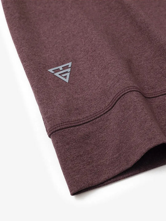 Sleeve cuff logo detail of BRICK HEATHER Quarter Zip Melange Pullover, premium design accent.