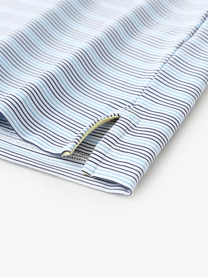 Close-up of side hem slit on Navy Blue Stripe Performance Stripe Golf Shirt