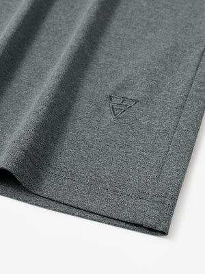 Hem detail of Men’s Long Sleeve Mock Turtleneck Shirt in Black Grey Heather, showcasing smooth finish.