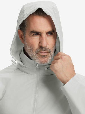 Close-up of hood on the lightweight water-repellent softshell hooded jacket, worn by model in glacier grey.