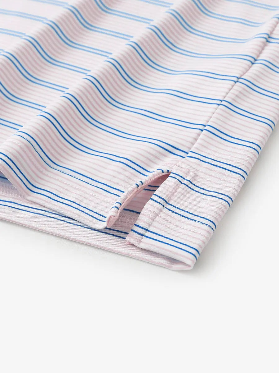 Close-up of side hem slit on Light Pink Cobalt Stripe Performance Stripe Golf Shirt