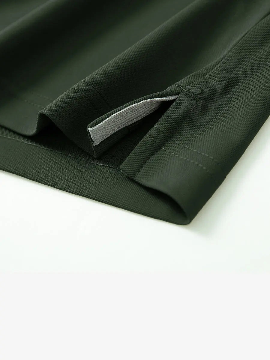 Detail shot of hem opening on OLIVE GREEN Ventilated Pique Performance Polo