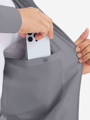 Hand placing iPhone into inner pocket of casual windproof bomber jacket in neutral grey