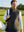 Lightweight Water-Resistant Puffer Vest, Black (Model Wearing The Vest Outdoors)