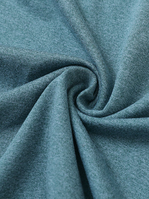 Fabric close-up of Quarter zip melange pullover with blended texture in aqua heather