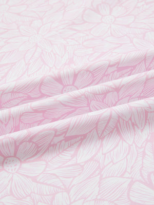 Close-up of pink artichoke full print lightweight quarter zip pullover fabric, soft and breathable texture