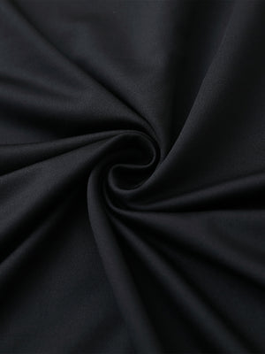 Close-up of black1 chest print polo shirt fabric showing smooth texture and crisp graphic application area.