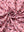 Close-up of pink donut golf performance print boys golf polo fabric showing moisture-wicking texture 
