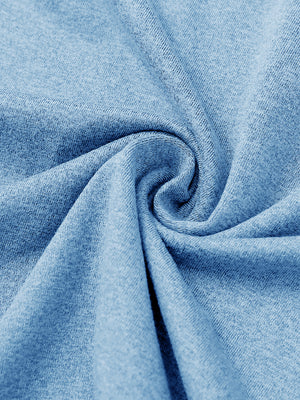 Close-up of melange fabric on quarter zip pullover, showing texture and detail in light blue melange.