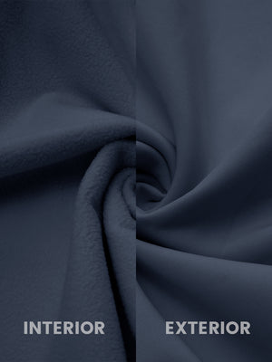 Close-up of misty blue softshell jacket showing water resistant outer shell and smooth inner lining.