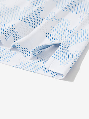 Detail: hem slit of sky blue camo stretch printed collarless henley golf shirts