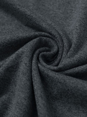 Close-up fabric detail of skin-friendly long sleeve melange polo, soft blend texture with dark grey heather tone