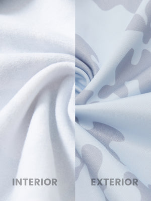 Fabric close-up of trendy print fleece hoodies, plush texture with warm grey white camouflage feel