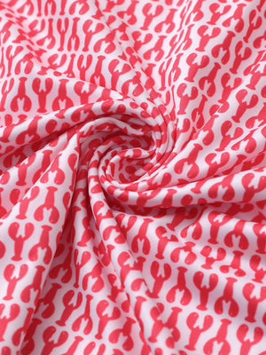 Fabric close-up of Everyday performance print polo with lightweight texture in red lobster