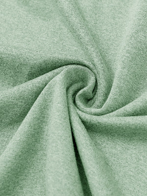 Close-up of melange fabric on quarter zip pullover, showing texture and detail in beryl green melange.