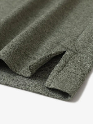 Olive Green Heather Skin-friendly Long Sleeve Melange Polo – close-up detail of side hem slit
