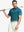 Front half-body pose with golf club, styled in TURQUOISE Performance Ananas Jacquard Polo