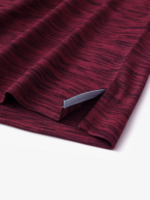 Close-up of side hem slit in BURGUNDY HEATHER Cool Heather Texture Polo
