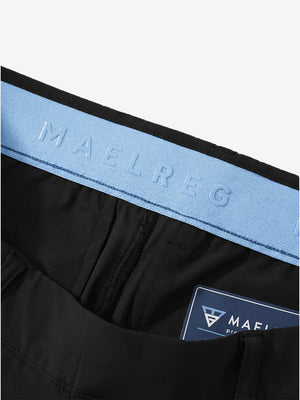 Detail view of inner waistband on black women's regular fit stretchy golf pants