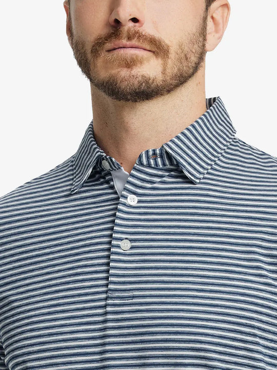 Front close-up shot of model from nose to chest wearing Sport Fit Stripe Polo in Dark Blue Stripe