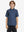 Front half-body shot of youth in green seahorse performance print boys golf polo, highlighting design and fit