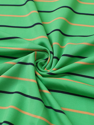Close-up of green stripe stylish stripe jersey golf polo fabric showing smooth texture and breathable knit.