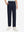 Front lower body shot of model wearing the navy youth water resistant cotton blend golf pants, showcasing a relaxed fit