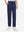 Front lower body shot of model wearing the dark blue youth water resistant cotton blend golf pants, showcasing a relaxed fit