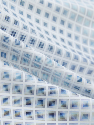 Close-up of blue abstract lightweight stretch upgraded print golf polo shirts, showcasing texture and print details.