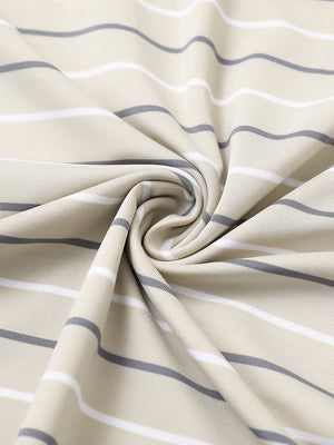 Close-up of light khaki stripe stylish stripe jersey golf polo fabric showing smooth texture and breathable knit.
